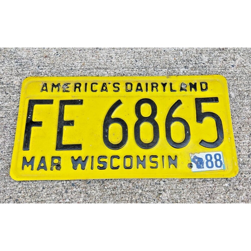 Vintage 1988 Wisconsin License Plate Dairyland March Yellow Sticker #FE6865